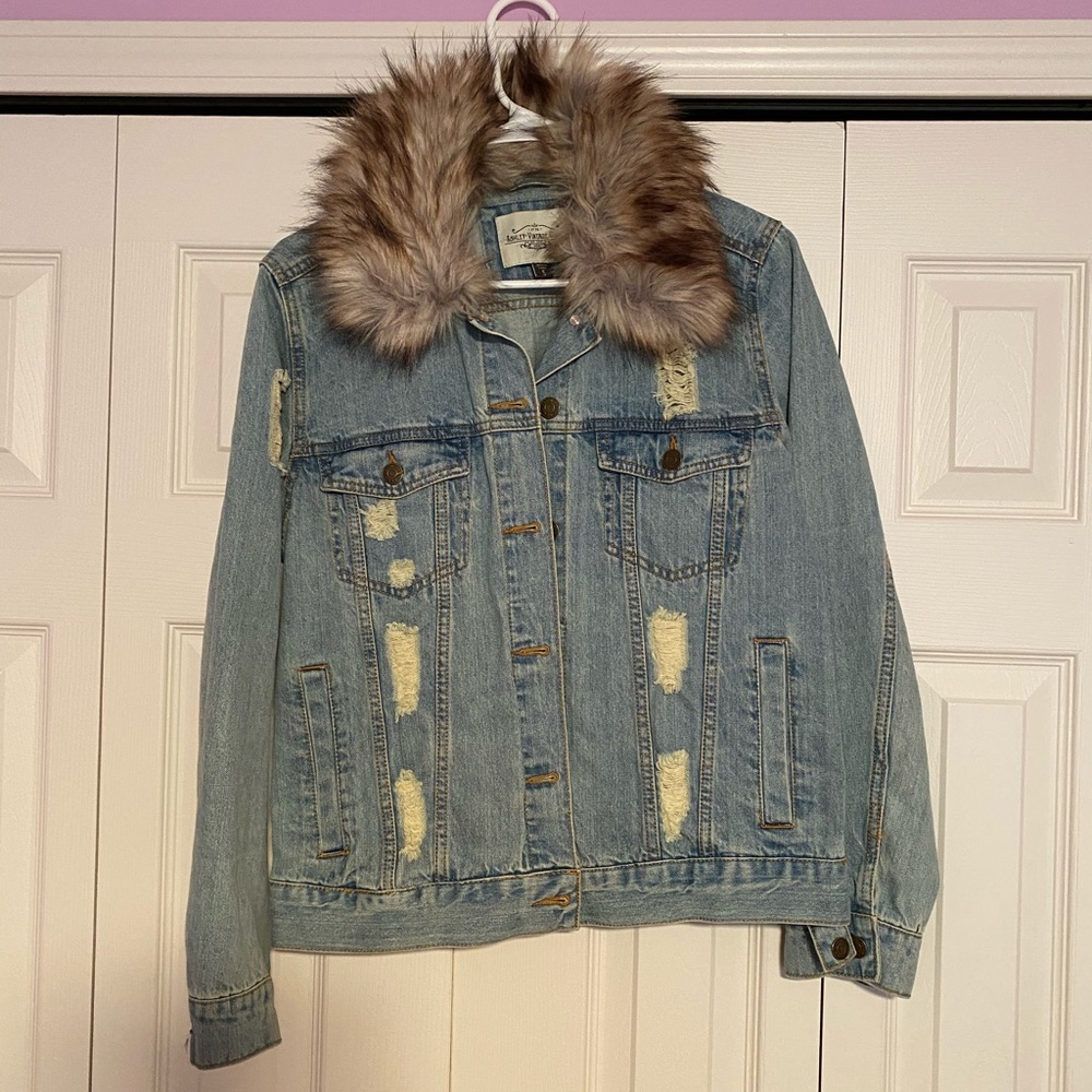 Distressed denim jacket with removable fur collar